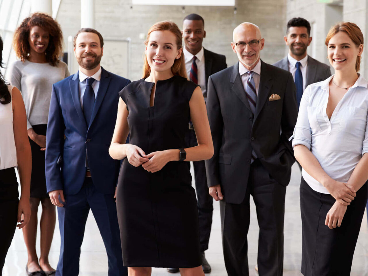 Business people standing in a group